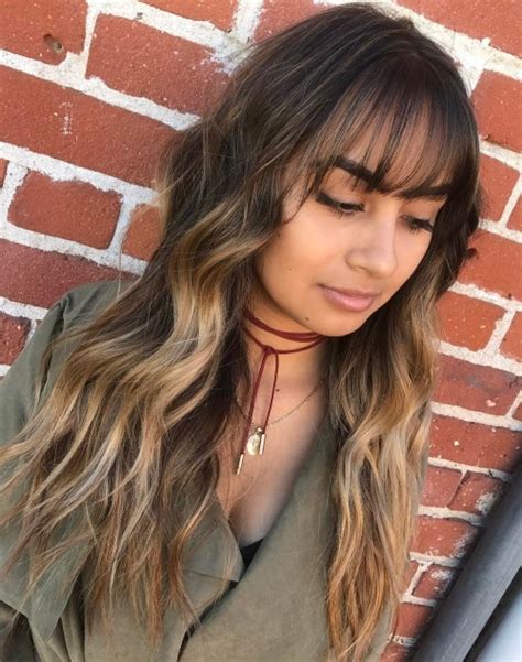 Lots of layers around the face and crown. 50 Cute Long Layered Haircuts with Bangs 2017
