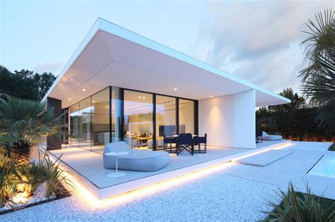 Outdoor Lighting Adds A Dramatic Element To This Modern White House