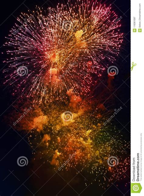 Colorful Fireworks On Dark Night Sky Background Holiday Light Stock