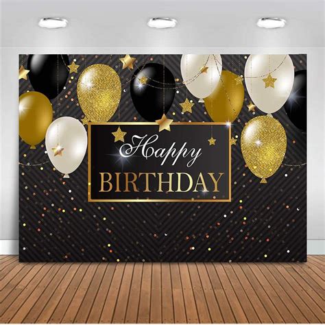 A Birthday Party Backdrop With Balloons And Confetti In Gold Black And