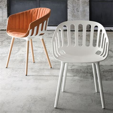 The most common metal outdoor chair material is metal. Basket: Modern armchair with seat in technopolymer, with ...