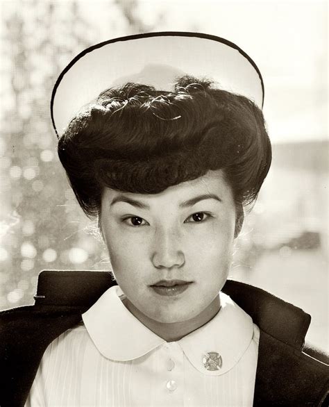 an old photo of a woman wearing a sailor s hat