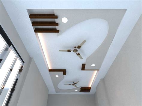 Ceiling fans used to look too utilitarian that interior design specialists would wryly shake their heads whenever clients would ask to incorporate one in a room's general design. Pop Ceiling Design For Hall With 2 Fans - New Blog ...