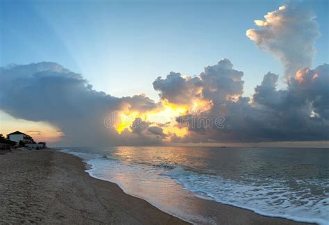 Summer Seascape Sunrise On The Beach And Cloudy Sky Stock Photo