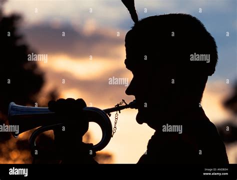 Silhouette Of A Man Playing A Bugle Stock Photo Alamy