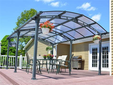 Most steel single carports look to run right around $2200.00 regardless if it's freestanding or attached at diyhomeimprovementkits.com. Crescent Curved Roof - The Canopy Shop