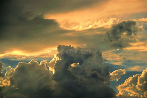 Heavy And Dramatic Storm Cloud Formations In Colorful Summer Sky At