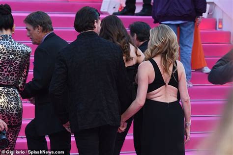 Denise Richards 53 Puts On A Very Leggy Display In A Racy Black Gown At The Canneseries