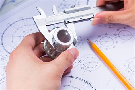 Mechanical Design Engineer In Drawing Stock Image Image Of Asphalt
