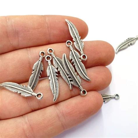 10 Feather Charms Antique Silver Plated Charms (27x6mm) G19771 | Silver feather, Feather charms ...