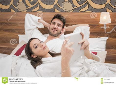 Beautiful Happy Young Couple Enjoying In Bed After Spa Couple I Stock
