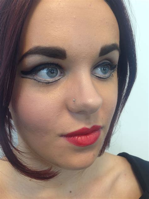 Theatre Makeup To Make Eyes Look Bigger With A White Eyeliner On The