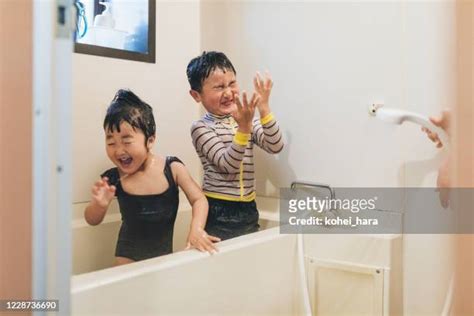 Two Girls Taking Shower Together Photos And Premium High Res Pictures