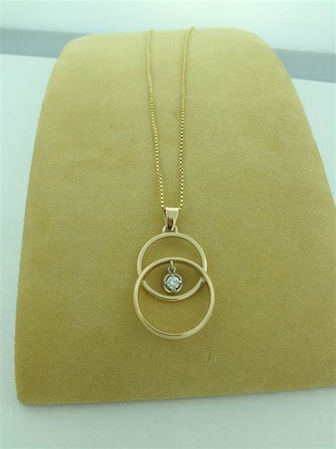 This Is A Necklace We Made For A Customer We Combined Her Wedding Band