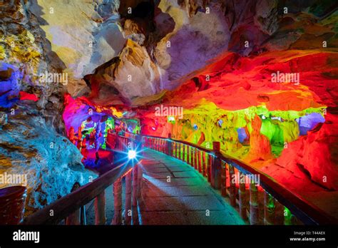 The Beautiful Seven Star Cave With Colorful Lights And Reflection At
