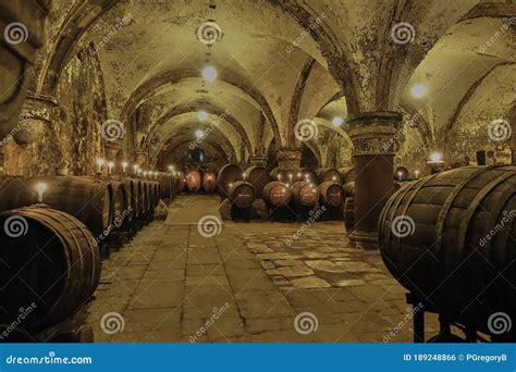 Old Wine Cellar With Candles Glowing In Old Cave Mosel Germany