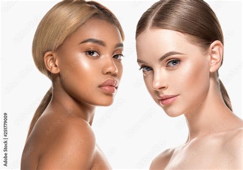 Two Wemen With Dark And Light Skin Tone Caucasian And African American