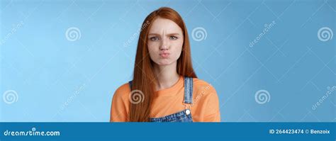 moody displeased clingy girlfriend redhead blue eyes pouting sulking upset offended frowning