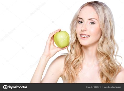 Woman Holding Apple In Hand — Stock Photo © Andrewlozovyi 163328314