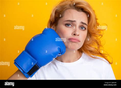 Funny Woman With Boxing Gloves With Punching Face Isolated On Yellow