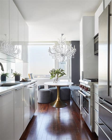 White Galley Kitchen And Chandelier Hgtv