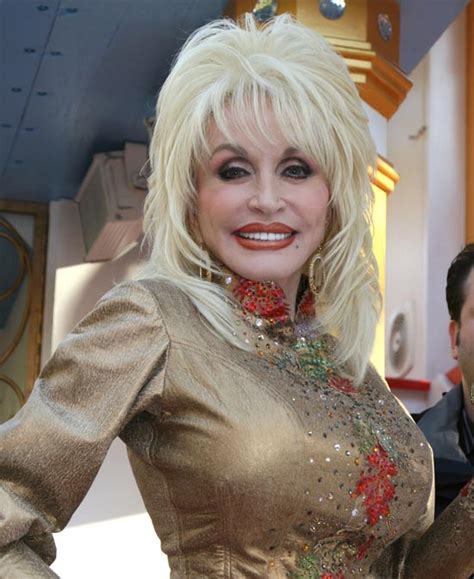 Previous Next Country Singer Dolly Parton Keeps Herself Looking Young