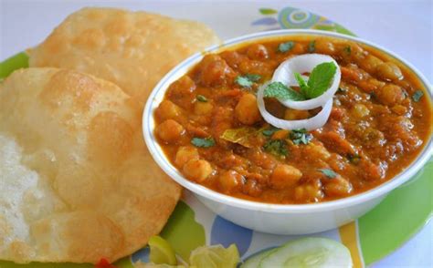 Check out this easy chole bhature recipe. Chole Bhatura (Chickpeas in Spicy Gravy with Indian Bread ...