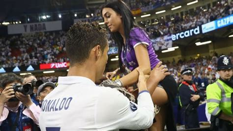 cristiano ronaldo celebrates on pitch with his girlfriend georgina rodriguez in 2023 cute