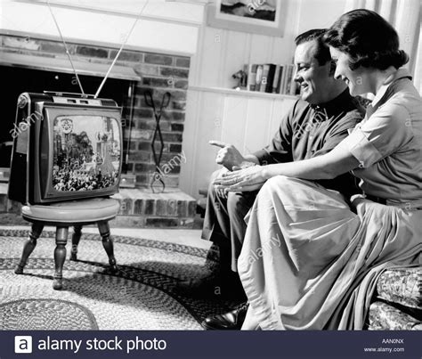 How 2 adults, 3 kids and 2 dogs live in 300 sq ft. 1950s COUPLE HUSBAND AND WIFE WATCHING TV IN LIVING ROOM ...