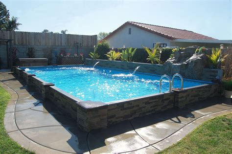 A semi inground swimming pool with wooden deck. Semi Inground Pools Long island | AdinaPorter