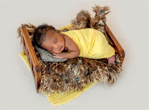 Premium Photo Newborn Sleeping In Cradle