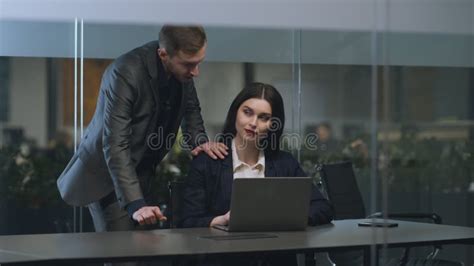 Flirt At Workplace Young Businesswoman Working On Laptop At Office