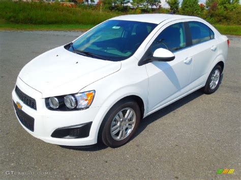 I take viewers on a close look through the interior. Summit White 2012 Chevrolet Sonic LT Sedan Exterior Photo ...