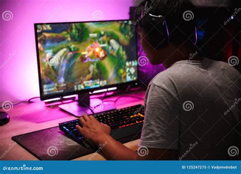 Photo Of Teenage Gamer Boy Playing Video Games On Computer In Da Stock