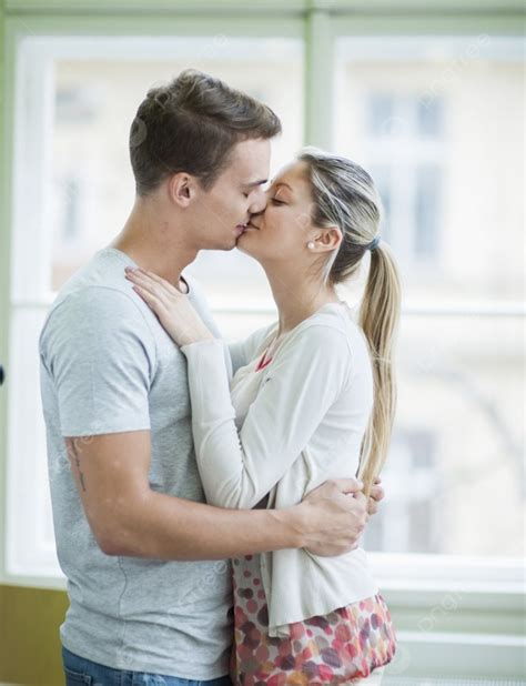 Passionate Couple Kissing In House Photo Background And Picture For
