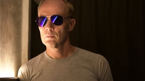 mature scandinavian man wearing sunglasses while thinking at night stock footage