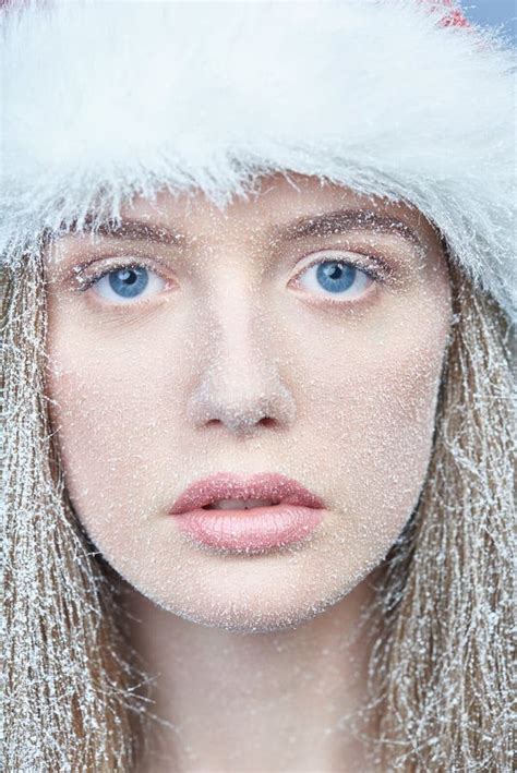 Frozen Girl With Snow On Face Wearing Santa Hat Stock Photo Image Of