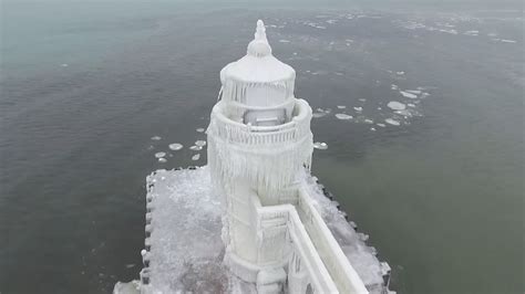 Watch Drone Reveals Lake Michigan Lighthouse Plastered In Ice The