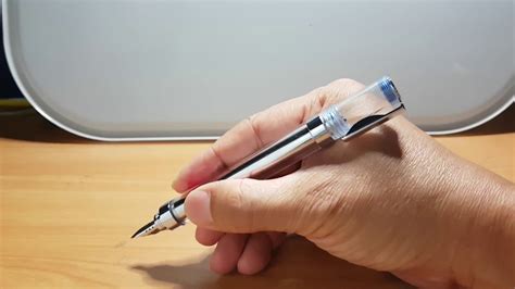 The line remains medium in size. cerruti 1881 clear fountain pen - YouTube
