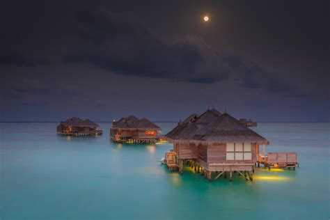 maldives moon resort sea bungalow clouds tropical beach nature landscape wallpaper