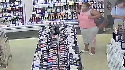 Woman Caught On Surveillance Stealing 18 Bottles Of Liquor Youtube