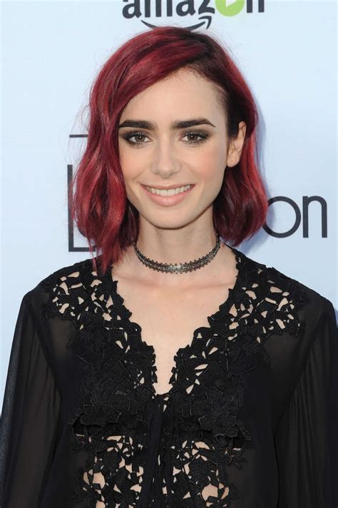 Lily Collins Wows On The Red Carpet With Bright Red Hair