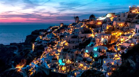 The Stunning Town Of Oia Santorini At Twilight Rpics