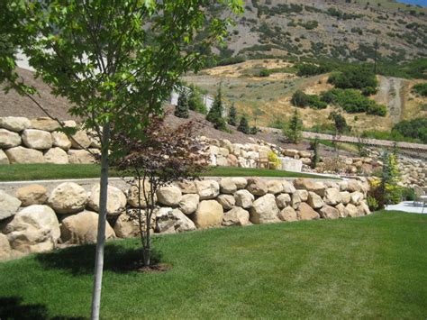 Inspiration for a traditional shade stone landscaping in boston. Rock Walls