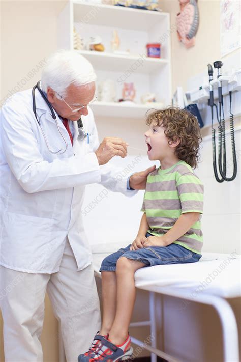 Doctor Examining Boy In Office Stock Image F0053170 Science