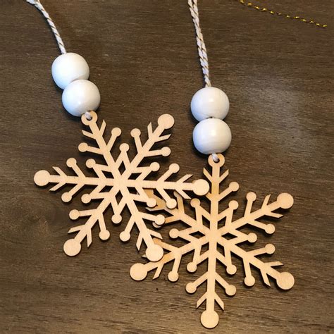 Diy Wood Bead And Snowflake Ornaments Frugally Fantastic