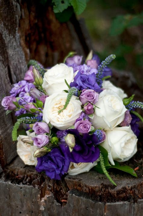 Add purple flowers to your entryway so that guests feel calm and welcome upon entry. Bella Fiori designs flowers for weddings in Washington ...