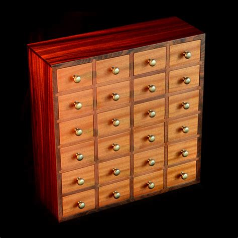 This Small Drawer Cabinet Features Twenty Four Small Drawers The