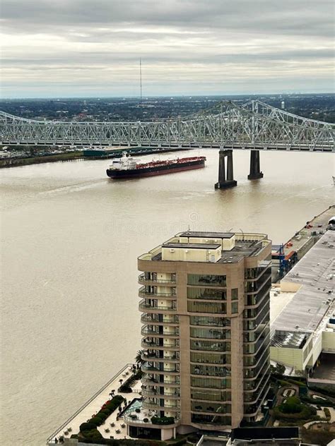 Aerial Of Freighter At Bridge Over Mississippi River At New Orleans
