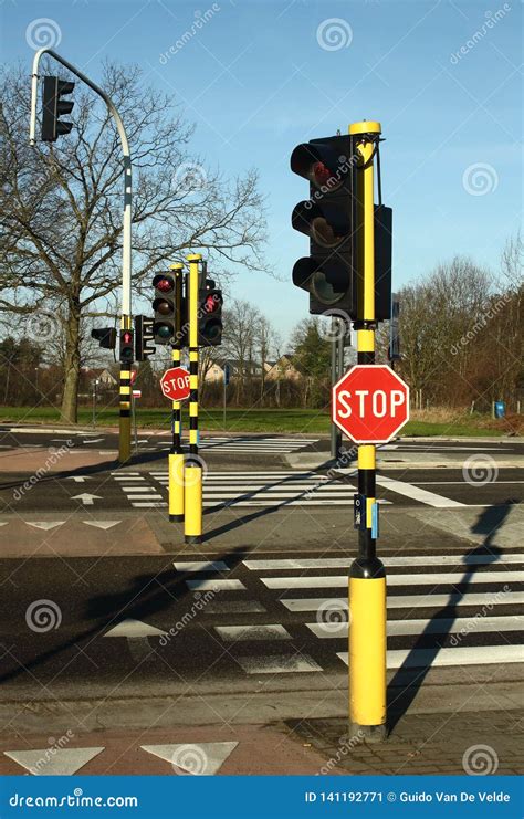 Crosswalk Stop Signs And Traffic Lights Royalty Free Stock Photo